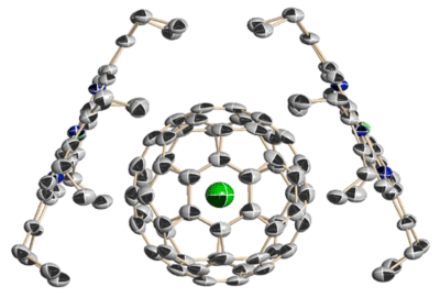 Figure 1.  Single crystal X-ray structure of He@C60 sandwiched by two porphirin molecules