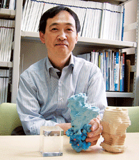 Professor Toyoshima with handmade models